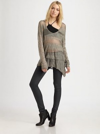 Metallic, sheer and perfect for layering, this asymmetrical knit adds intrigue to any look.ScoopneckDropped shouldersLong sleevesAsymmetrical hemAbout 26 from shoulder to hem87% cotton/13% metallic fibersDry cleanImportedModel shown is 5'9½ (177cm) wearing US size Small. Metallic, sheer and perfect for layering, this asymmetrical knit adds intrigue to any look.ScoopneckDropped shouldersLong sleevesAsymmetrical hemAbout 26 from shoulder to hem87% cotton/13% metallic fibersDry cleanImportedModel shown is 5'9½ (177cm) wearing US size Small.