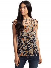 THE LOOKCrewneckPullover styleSleevelessSheer, abstrast printBack cowl detail with constrast print underlayTail hemTHE FITLoose fit silhouetteAbout 29 from shoulder to longest point of hemTHE MATERIALSilkCARE & ORIGINDry cleanMade in USA THE LOOKCrewneckPullover styleSleevelessSheer, abstrast printBack cowl detail with constrast print underlayTail hemTHE FITLoose fit silhouetteAbout 29 from shoulder to longest point of hemTHE MATERIALSilkCARE & ORIGINDry cleanMade in USA