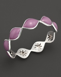 Bright purple enamel drops over a carved sterling silver bangle By Elizabeth Showers. Bright purple enamel drops over a carved sterling silver bangle By Elizabeth Showers.