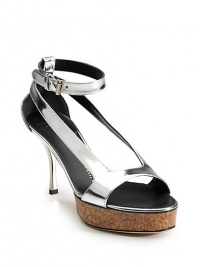 THE LOOKCutout strap metallic patent leather upperAdjustable ankle strap with buckleTHE FITManmade heel, 3½ (90mm)Cork platform, 1 (25mm)Compares to a 2½ heel (65mm)THE MATERIALLeather upperLeather sole and liningORIGINMade in Italy THE LOOKCutout strap metallic patent leather upperAdjustable ankle strap with buckleTHE FITManmade heel, 3½ (90mm)Cork platform, 1 (25mm)Compares to a 2½ heel (65mm)THE MATERIALLeather upperLeather sole and liningORIGINMade in Italy