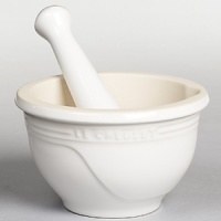 Enhance your meal with freshly ground spices and herbs. The unglazed interior makes grinding easy, and the glossy enamel exterior and large size make it an appealing serving dish. Enhance your meal with freshly ground spices and herbs. The unglazed interior makes grinding easy, and the glossy enamel exterior and large size make it an appealing serving dish.