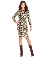 A classic shirtdress silhouette gets modernized with a chic status print in this look from Ellen Tracy. A classic shirtdress silhouette gets modernized with a chic status print in this look from Ellen Tracy.