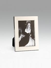 Sleek, modern silverplate design gives special presence to a favorite photo. Made in ItalyDIMENSION INFORMATION3 X 4 (4 X 5 overall)4 X 6 (5 X 7 overall) Sleek, modern silverplate design gives special presence to a favorite photo. Made in ItalyDIMENSION INFORMATION3 X 4 (4 X 5 overall)4 X 6 (5 X 7 overall)