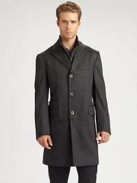 Chalk stripe overcoat is the perfect modern addition to your suiting wardrobe, expertly tailored in superior Italian wool, featuring a zip-out front vest panel, an additional front ticket pocket and velvet trim detail under the collar.Button-frontNotch lapelChest welt, waist flap pocketsRear ventWoolDry cleanMade in Italy Chalk stripe overcoat is the perfect modern addition to your suiting wardrobe, expertly tailored in superior Italian wool, featuring a zip-out front vest panel, an additional front ticket pocket and velvet trim detail under the collar.Button-frontNotch lapelChest welt, waist flap pocketsRear ventWoolDry cleanMade in Italy