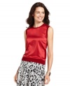 Jones New York's satin and knit top is a chic topper with printed skirts, jeans and skinny pants. Check out the matching cardigan to make a modern twinset!