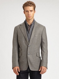 Expect the unexpected with this classically-inspired three-button blazer shaped in the supreme softness of a wool and cashmere blend, featuring a zip-out front vest panel and an additional front ticket pocket.Button-frontNotch lapelChest welt, waist flap pocketsSide vents86% wool/14% polyesterDry cleanMade in Italy Expect the unexpected with this classically-inspired three-button blazer shaped in the supreme softness of a wool and cashmere blend, featuring a zip-out front vest panel and an additional front ticket pocket.Button-frontNotch lapelChest welt, waist flap pocketsSide vents86% wool/14% polyesterDry cleanMade in Italy
