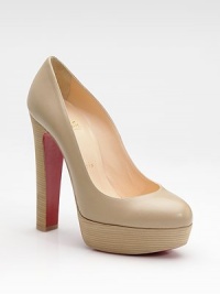 Sleek, contoured leather combines with the comfort of a wooden platform.Stacked heel, 5½ (140mm) Wooden platform, 1¼ (30mm) Compares to a 4¼ heel (110mm) Rounded toe Leather lining Padded insole Signature red leather sole Made in ItalyOUR FIT MODEL RECOMMENDS ordering true size. Additional Information Women's Shoe Size Guide (International Equivalents) Sleek, contoured leather combines with the comfort of a wooden platform.Stacked heel, 5½ (140mm) Wooden platform, 1¼ (30mm) Compares to a 4¼ heel (110mm) Rounded toe Leather lining Padded insole Signature red leather sole Made in ItalyOUR FIT MODEL RECOMMENDS ordering true size. Additional Information Women's Shoe Size Guide (International Equivalents)