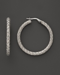 Woven hoops in sterling silver from Fifth Season by Roberto Coin. Woven hoops in sterling silver from Fifth Season by Roberto Coin.