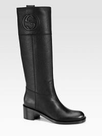 Tall pebbled leather silhouette with a stacked heel and GG logo. Stacked heel, 2 (50mm)Shaft, 16Leg circumference, 14Leather upperPull-on styleLeather lining and solePadded insoleMade in Italy Tall pebbled leather silhouette with a stacked heel and GG logo. Stacked heel, 2 (50mm)Shaft, 16Leg circumference, 14Leather upperPull-on styleLeather lining and solePadded insoleMade in Italy