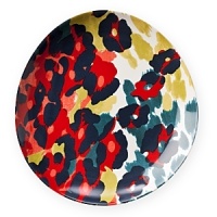 This set of dessert plates features a fresh take on an animal print to punctuate the table with boldness. Pair with solid colors and geometric shapes to create an adventurous setting. This set of dessert plates features a fresh take on an animal print to punctuate the table with boldness. Pair with solid colors and geometric shapes to create an adventurous setting.