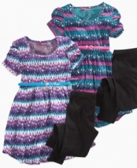 A long print dress from Epic Threads is highlighted with an adorable accessory belt and comfy leggings for a style that complements her sweet looks. A long print dress from Epic Threads is highlighted with an adorable accessory belt and comfy leggings for a style that complements her sweet looks.