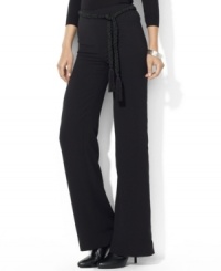 A modern wide-leg pant is crafted in fluid crepe with a heritage-inspired braided belt. A modern wide-leg pant is crafted in fluid crepe with a heritage-inspired braided belt.
