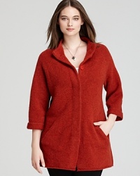 Plush wool crafts a cozy Eileen Fisher Plus jacket touting a modern funnel neckline and minimalist silhouette for cold-weather chic. Plush wool crafts a cozy Eileen Fisher Plus jacket touting a modern funnel neckline and minimalist silhouette for cold-weather chic.