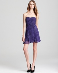 Slip into the exotic. This jewel-tone, strapless Sachin + Babi printed dress is the picture of party perfection with a flouncy, pleated skirt that creates quite the distraction once it hits the dance floor. Slip into the exotic. This jewel-tone, strapless Sachin + Babi printed dress is the picture of party perfection with a flouncy, pleated skirt that creates quite the distraction once it hits the dance floor.