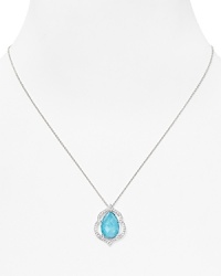 Inspired by the simplicity of colored gem stones, Nadri's crystal-rimmed pendant necklace is an eye-catching adornment that you'll wear now and treasure forever. Inspired by the simplicity of colored gem stones, Nadri's crystal-rimmed pendant necklace is an eye-catching adornment that you'll wear now and treasure forever.