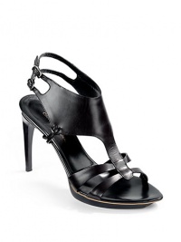 THE LOOKT-strap leather upperWide top strap with double buckle ankle strapsSkinny leather straps with knot detailsStacked sculpted heel, 4 (100mm)Self-covered island platform, ½ (15mm)Compares to a 3½ heel (90mm)THE MATERIALLeather upperLeather lining and soleORIGINMade in Italy