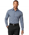 Van Heusen's no-iron shirt features a timeless striped pattern, perfect for the stylish jet-setter always on the go.