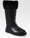 Soft rabbit fur tops this quilted nylon and leather essential, with a rubber trek sole for durability and added traction. Rubber heel, 1 (25mm)Rubber platform, ¾ (20mm)Shaft, 11¼Leg circumference, 13Nylon and leather upper with rabbit fur trimPull-on styleFleece liningRubber solePadded insoleImported