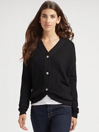 THE LOOKV-neckThree-button placketSlash side pockets with ribbed detailsLong sleeves with ribbed cuffsTHE FITAbout 26 from shoulder to hemTHE MATERIALCashmereCARE & ORIGINDry cleanImported THE LOOKV-neckThree-button placketSlash side pockets with ribbed detailsLong sleeves with ribbed cuffsTHE FITAbout 26 from shoulder to hemTHE MATERIALCashmereCARE & ORIGINDry cleanImported