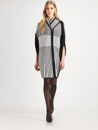 Geometric woven checks decorate this soft cocoon-style cape.Shawl collarAsymmetrical zip frontSide slitAbout 37 from shoulder to hem50% cotton/30% wool/20% polyesterDry cleanImportedModel shown is 5'9½ (176cm) wearing US size Small. Geometric woven checks decorate this soft cocoon-style cape.Shawl collarAsymmetrical zip frontSide slitAbout 37 from shoulder to hem50% cotton/30% wool/20% polyesterDry cleanImportedModel shown is 5'9½ (176cm) wearing US size Small.