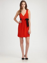 A lovely design that wraps the body in sleek style with a feminine neckline and waist-accentuating, chic contrast bow. V-neckSleevelessRibbon bow on elasticized Empire waistPull-on styleAbout 35 from shoulder to hem97% viscose/3% elastaneMade in ItalyDry clean Model shown is 5'10 (177cm) wearing US size 4. A lovely design that wraps the body in sleek style with a feminine neckline and waist-accentuating, chic contrast bow. V-neckSleevelessRibbon bow on elasticized Empire waistPull-on styleAbout 35 from shoulder to hem97% viscose/3% elastaneMade in ItalyDry clean Model shown is 5'10 (177cm) wearing US size 4.