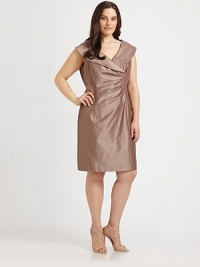 Stunning satin, a glam design with iridescent sheen, well-placed pleats and Princess seams for an unforgettable look.Shawl collarFlattering pleated details throughout bodicePrincess seamsBack zipperBack ventFully linedAbout 24 from natural waist56% polyester/38% nylon/6% spandexDry cleanImported Stunning satin, a glam design with iridescent sheen, well-placed pleats and Princess seams for an unforgettable look.Shawl collarFlattering pleated details throughout bodicePrincess seamsBack zipperBack ventFully linedAbout 24 from natural waist56% polyester/38% nylon/6% spandexDry cleanImported