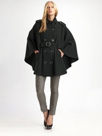A chic, forward-looking silhouette rendered in superfine wool with bold, structural details.Stand collarLong cape sleevesTab epaulettes with buttonsDouble-breasted button frontBuckle waistSide slash pocketsBack vent with buttonsAbout 30 from shoulder to hemFully lined70% wool/30% nylonDry cleanImportedModel shown is 5'10 (177cm) wearing US size Small. A chic, forward-looking silhouette rendered in superfine wool with bold, structural details.Stand collarLong cape sleevesTab epaulettes with buttonsDouble-breasted button frontBuckle waistSide slash pocketsBack vent with buttonsAbout 30 from shoulder to hemFully lined70% wool/30% nylonDry cleanImportedModel shown is 5'10 (177cm) wearing US size Small.