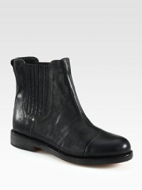 Every step is cool in this soft leather ankle boot with paneled construction and elastic panels for easy on and off access. Stacked heel, 1 (25mm)Leather upper with elastic panelsPull-on styleLeather lining and solePadded insoleImported Every step is cool in this soft leather ankle boot with paneled construction and elastic panels for easy on and off access. Stacked heel, 1 (25mm)Leather upper with elastic panelsPull-on styleLeather lining and solePadded insoleImported