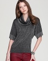 In shades of grey, this MICHAEL Michael Kors sweater illuminates your everyday look with a generous shot of shimmer.