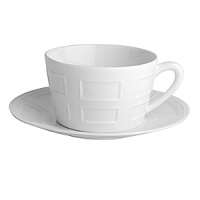 Architectural, white Limoges china with subtle relief patterns. Inspired by the coffered ceilings of Renaissance castles, its geometric motif emphasizes the sense of depth and quality of the material. Architectural, white Limoges china with subtle relief patterns. Inspired by the coffered ceilings of Renaissance castles, its geometric motif emphasizes the sense of depth and quality of the material.
