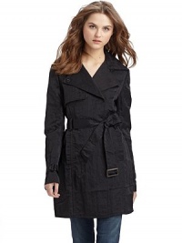 This essential layer exudes workweek chic with its double breasted front and gorgeous rumpled texture.Notched collar converts to point collar Concealed double breasted button front Single gun flap Long buckled belt ties at front Vertical welt pockets Back rain shield Inverted center back pleat with button closure at hem Cotton lining About 32½ from shoulder to hem 66% nylon/34% cotton; dry clean Imported This essential layer exudes workweek chic with its double breasted front and gorgeous rumpled texture.Notched collar converts to point collar Concealed double breasted button front Single gun flap Long buckled belt ties at front Vertical welt pockets Back rain shield Inverted center back pleat with button closure at hem Cotton lining About 32½ from shoulder to hem 66% nylon/34% cotton; dry clean Imported