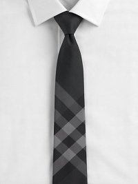A signature look for you in a signature check pattern from Burberry, crafted with a skinnier silhouette in fine mulberry silk. About 2¾ wide Mulberry silk Dry clean Made in Great Britain A signature look for you in a signature check pattern from Burberry, crafted with a skinnier silhouette in fine mulberry silk. About 2¾ wide Mulberry silk Dry clean Made in Great Britain
