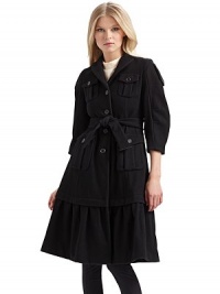 Military styling fused with ladylike influences for a luxurious wool overcoat that commands attention.Notched collar ¾ puffed sleeves with button tabs Front button closure Front button flap pockets Buckled belt ties at the waist Long ruffled hem About 40 from shoulder to hem Fully lined Wool; dry clean Made in Italy Military styling fused with ladylike influences for a luxurious wool overcoat that commands attention.Notched collar ¾ puffed sleeves with button tabs Front button closure Front button flap pockets Buckled belt ties at the waist Long ruffled hem About 40 from shoulder to hem Fully lined Wool; dry clean Made in Italy