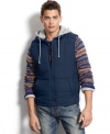 Layer yourself in sleek style with this cool hooded puffer vest by American Rag.