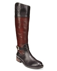 Rich multi-tonal leather, logo crests and buckle details lend these VINCE CAMUTO riding boots a sophisticated, equestrian look. Rich multi-tonal leather, logo crests and buckle details lend these VINCE CAMUTO riding boots a sophisticated, equestrian look.