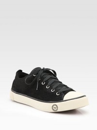 Low top suede laceup sneaker with logo detail at the round toe and heel.Contrast stitch detail Shearling lining Padded insole Rubber sole Imported Low top suede laceup sneaker with logo detail at the round toe and heel.Contrast stitch detail Shearling lining Padded insole Rubber sole Imported