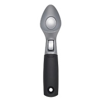The OXO International Ice Cream Scoop has a unique aluminum beak shape, a thin tip to break into hard ice cream, curved side edges to roll perfectly round scoops and large capacity to satisfy big appetites. While the Scoop has non-stick coating for easy release, for extra sticky ice cream try the ejector button and watch ice cream glide off the Scoop and into your bowl. Even soft ice cream and yogurt ends up in your bowl, not sticking to the Scoop. The Scoops flat back is great for both round and square ice cream containers. Enjoy the contoured non-slip handle to cushion your hand as you scoop. The OXO International Ice Cream Scoop has a unique aluminum beak shape, a thin tip to break into hard ice cream, curved side edges to roll perfectly round scoops and large capacity to satisfy big appetites. While the Scoop has non-stick coating for easy release, for extra sticky ice cream try the ejector button and watch ice cream glide off the Scoop and into your bowl. Even soft ice cream and yogurt ends up in your bowl, not sticking to the Scoop. The Scoops flat back is great for both round and square ice cream containers. Enjoy the contoured non-slip handle to cushion your hand as you scoop.