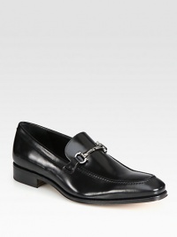 Timeless slip-on articulated in brushed calfskin with iconic gancini ornament.Calfskin upperLeather liningPadded insoleLeather soleMade in Italy Timeless slip-on articulated in brushed calfskin with iconic gancini ornament.Calfskin upperLeather liningPadded insoleLeather soleMade in Italy