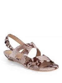 THE LOOKStrappy snakeskin printed leatherAdjustable ankle strapCone stud accentsPadded insoleSelf-covered wedge, 1½ (40mm)THE MATERIALLeather upperLeather lining and soleORIGINImported THE LOOKStrappy snakeskin printed leatherAdjustable ankle strapCone stud accentsPadded insoleSelf-covered wedge, 1½ (40mm)THE MATERIALLeather upperLeather lining and soleORIGINImported