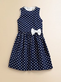 Connecting the dots will lead you to this standout frock with dainty bow detail, creating a soirée perfect ensemble.JewelneckSleevelessBack zipperFull skirtCottonDry cleanMade in the USA Connecting the dots will lead you to this standout frock with dainty bow detail, creating a soirée perfect ensemble.JewelneckSleevelessBack zipperFull skirtCottonDry cleanMade in the USA