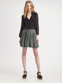 Sheer chiffon sleeves and a sophisticated tie-collar elevate this elegantly-tailored silk button-down.Tie-front collarV necklineGathered sleevesShirttail hemGathered back yokeAbout 23 from shoulder to hemSilkDry cleanMade in ItalyModel shown is 5'10 (177cm) wearing US size 4. Sheer chiffon sleeves and a sophisticated tie-collar elevate this elegantly-tailored silk button-down.Tie-front collarV necklineGathered sleevesShirttail hemGathered back yokeAbout 23 from shoulder to hemSilkDry cleanMade in ItalyModel shown is 5'10 (177cm) wearing US size 4.