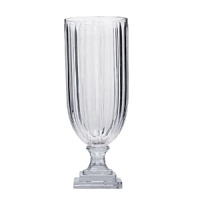 This hand-cut glass vase boasts a unique square base and exudes a vintage feel.