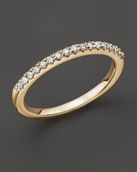 An elegant diamond ring in 14 Kt. yellow gold that can be worn stacked. An elegant diamond ring in 14 Kt. yellow gold that can be worn stacked.