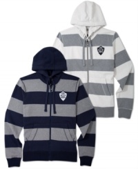 American Rag riffs on the classic collegiate warm-up with a rugby-striped zip-up hoodie complete with a college-style crest on the chest. American Rag riffs on the classic collegiate warm-up with a rugby-striped zip-up hoodie complete with a college-style crest on the chest.