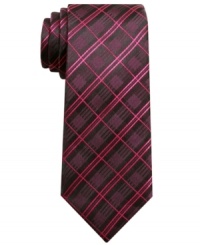Work the grid. A cool pattern and a skinny shape straighten out your work style with clean modernity. Work the grid. A cool pattern and a skinny shape straighten out your work style with clean modernity.