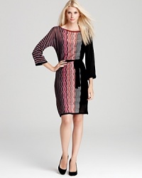 In a colorful knit, this Trina Turk sweater dress exudes vibrant style. In a colorful knit, this Trina Turk sweater dress exudes vibrant style.