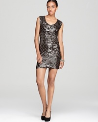 Light up the room in this sparkly, sequin-adorned party dress by GUESS. Light up the room in this sparkly, sequin-adorned party dress by GUESS.