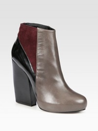 Bands of suede, polished leather and a block heel combine on this trend-worthy platform design. Self-covered leather heel, 4¾ (120mm)Covered platform, ¾ (20mm)Compares to a 4 heel (100mm)Leather and stretch suede upperPull-on styleLeather lining and solePadded insoleMade in Italy Bands of suede, polished leather and a block heel combine on this trend-worthy platform design. Self-covered leather heel, 4¾ (120mm)Covered platform, ¾ (20mm)Compares to a 4 heel (100mm)Leather and stretch suede upperPull-on styleLeather lining and solePadded insoleMade in Italy