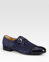 Navy suede and navy python with silver hardware.Monkstrap with buckle closureRubber soleMade in Italy