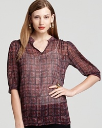 The classic dress shirt gets a modern rethink as a sheer silhouette and edgy plaid print shake up this Shiloh770 blouse. The classic dress shirt gets a modern rethink as a sheer silhouette and edgy plaid print shake up this Shiloh770 blouse.